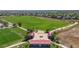 Expansive community park with open green space, playground, and sports fields, perfect for outdoor activities at 13884 Lilac St, Thornton, CO 80602