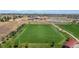 Aerial view of a sports field with soccer goals, and recreational areas, ideal for outdoor activities and community engagement at 13884 Lilac St, Thornton, CO 80602