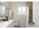 Clean bathroom featuring a vanity, toilet, and shower-tub combination with tile surround at 6213 S Galena Way, Englewood, CO 80111