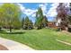 Well-maintained community lawn with walking path at 6213 S Galena Way, Englewood, CO 80111