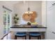 This eat-in kitchen features a built in bar and glass door to the backyard at 6213 S Galena Way, Englewood, CO 80111