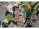 Overhead view of a home with a deck, patio, fire pit, and fenced yard in a suburban neighborhood at 12646 S Dove Creek Way, Parker, CO 80134