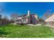 Well-maintained backyard with a deck and lush green lawn at 12646 S Dove Creek Way, Parker, CO 80134