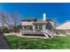 Grassy backyard and deck offer great outdoor space at 12646 S Dove Creek Way, Parker, CO 80134
