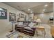 Finished basement featuring sofas and sports memorabilia at 12646 S Dove Creek Way, Parker, CO 80134