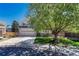 Charming two-story home with mature landscaping, a well-manicured lawn, and a two-car garage at 12646 S Dove Creek Way, Parker, CO 80134
