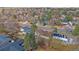 Expansive aerial view of a suburban neighborhood with mature trees and well-maintained homes and landscaping at 8690 E Chenango Ave, Denver, CO 80237