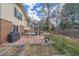 Back patio with patio seating, grill, and garden area at 8690 E Chenango Ave, Denver, CO 80237