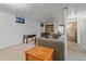 Finished basement area with comfortable seating, wood accents, and natural light at 8690 E Chenango Ave, Denver, CO 80237