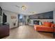 Relaxing living room features a fireplace, sliding glass doors, and comfortable seating at 8690 E Chenango Ave, Denver, CO 80237