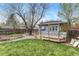 Backyard with a shed and a covered bench on a wooden deck at 1920 S Downing St, Denver, CO 80210