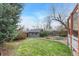 View of the backyard showcasing a detached shed at 1920 S Downing St, Denver, CO 80210