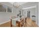 Inviting dining area with hardwood floors, natural light, stylish décor, and an open layout for memorable dining experiences at 1920 S Downing St, Denver, CO 80210