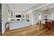 Stylish living room featuring hardwood floors, open layout and a view into the dining room at 1920 S Downing St, Denver, CO 80210