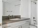 Modern bathroom features a vanity with gray countertops, sink, and modern fixtures at 2835 W Parkside Pl # 305, Denver, CO 80221