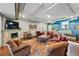 Comfortable living room featuring a fireplace, plush seating, a large window, and stylish decor for relaxation and gatherings at 2835 W Parkside Pl # 305, Denver, CO 80221