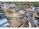 Aerial view of home foundation amidst a residential neighborhood, showcasing the construction progress at 933 Saint Andrews Ln, Louisville, CO 80027