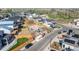 Aerial view of a residential area with a foundation being built at 933 Saint Andrews Ln, Louisville, CO 80027