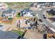 Aerial shot featuring foundation construction in a developing residential community at 933 Saint Andrews Ln, Louisville, CO 80027