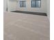 Unfinished basement featuring plush carpeting, bright, natural light and a neutral color palette ready for customization at 933 Saint Andrews Ln, Louisville, CO 80027
