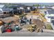 Construction site showing foundation work and machinery, offering a glimpse into building a new home in a growing community at 933 Saint Andrews Ln, Louisville, CO 80027