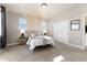 Bright bedroom with window and sliding door at 4911 Colorado River Dr, Firestone, CO 80504