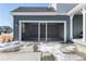 Attached garage with screen door, providing extra storage and ventilation at 4911 Colorado River Dr, Firestone, CO 80504