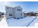 Rear view of two-story house, showcasing the siding and backyard at 4911 Colorado River Dr, Firestone, CO 80504