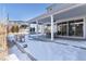Covered patio with outdoor dining set and view at 4911 Colorado River Dr, Firestone, CO 80504