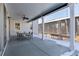 Covered patio with outdoor dining set at 4911 Colorado River Dr, Firestone, CO 80504