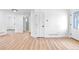 Bright and spacious living area featuring luxury vinyl plank flooring throughout at 4556 S Pagosa Way, Aurora, CO 80015