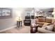 Finished basement with a comfortable seating area, and neutral decor at 735 Poppy Pl, Highlands Ranch, CO 80129
