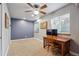 Bonus room featuring a large ceiling fan, carpet, a desk and natural light at 735 Poppy Pl, Highlands Ranch, CO 80129