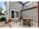 Backyard patio with a dining set, offering an outdoor space for dining and relaxation at 13025 Umatilla Ct, Denver, CO 80234