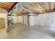 Unfinished basement space with exposed ductwork and newly insulated walls and concrete flooring at 13025 Umatilla Ct, Denver, CO 80234