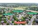 Aerial view of neighborhood with greenbelt/paths and 7830 W Friend Pl highlighted at 7830 W Friend Pl, Littleton, CO 80128
