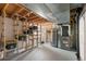 Unfinished basement with built in storage and mechanicals at 7830 W Friend Pl, Littleton, CO 80128