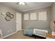 Bedroom with neutral decor, carpet, and window for natural light at 637 Millet Cir, Brighton, CO 80601