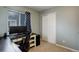 This office features a modern desk, sliding door closet, and window at 637 Millet Cir, Brighton, CO 80601