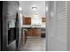 Efficient kitchen featuring modern appliances, wood cabinets, and durable countertops at 3224 S Dudley St, Lakewood, CO 80227