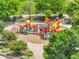 Colorful playground structure with slides, climbing areas, and soft landing surfaces nestled in the community at 3224 S Dudley St, Lakewood, CO 80227