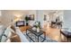 Open-concept living room featuring hardwood floors and an inviting atmosphere at 586 S Corona St, Denver, CO 80209