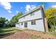 Two-story home features a spacious backyard and a brick chimney at 4474 S Vrain St, Denver, CO 80236