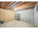 Unfinished basement with concrete walls and floor and exposed ceiling at 4474 S Vrain St, Denver, CO 80236