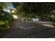Charming home boasts mature trees and natural landscaping, adding to its curb appeal at 4474 S Vrain St, Denver, CO 80236