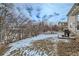 Sloped backyard with a patio area and grill offers a private outdoor space at 14096 Roaring Fork, Broomfield, CO 80023