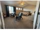 Large bedroom featuring vaulted ceilings, seating area, and natural light at 14096 Roaring Fork, Broomfield, CO 80023