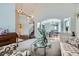 Spacious living room with staircase and view of dining area at 14096 Roaring Fork, Broomfield, CO 80023