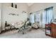 Bright living room with vaulted ceilings, stylish furniture, and large window at 14096 Roaring Fork, Broomfield, CO 80023
