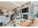 Living room features a fireplace and plenty of natural light at 16546 Umatilla Pl, Broomfield, CO 80023